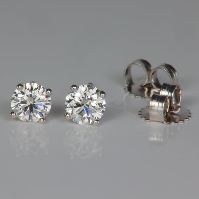 White gold round brilliant diamond earrings