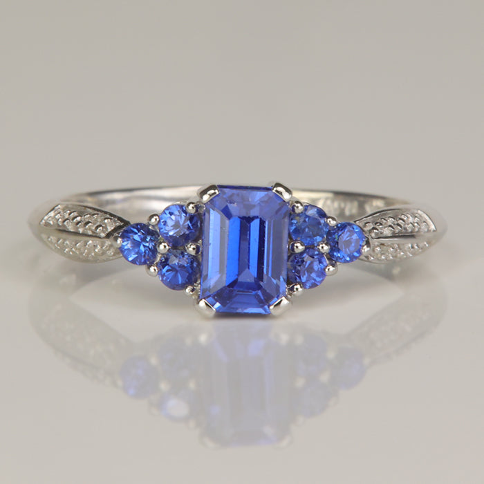 white gold steel blue lab created sapphire and diamond accented ring
