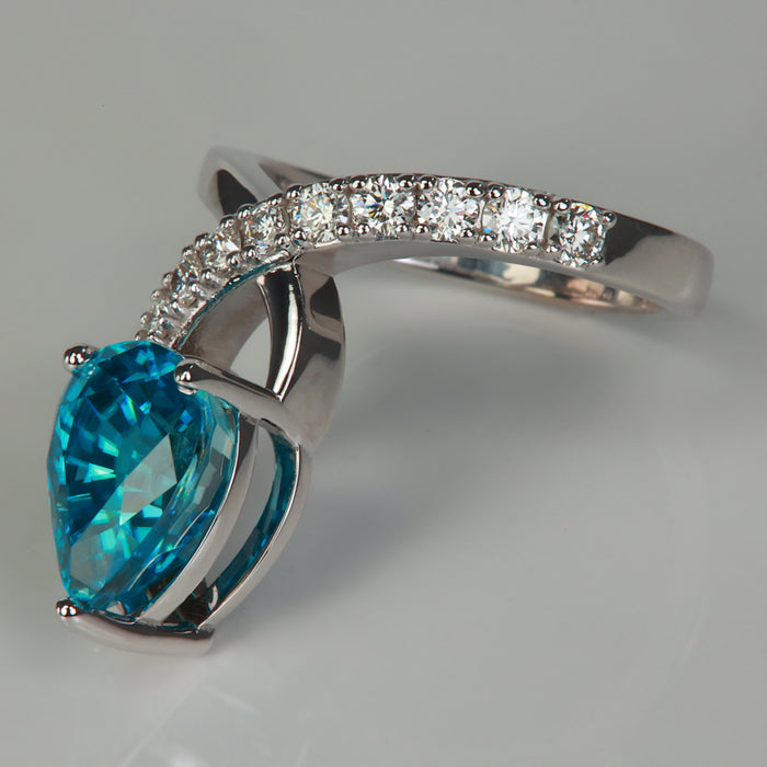 white gold diamond accented blue zircon ring