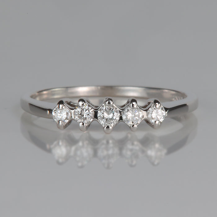 estate white gold ring with round brilliant diamonds