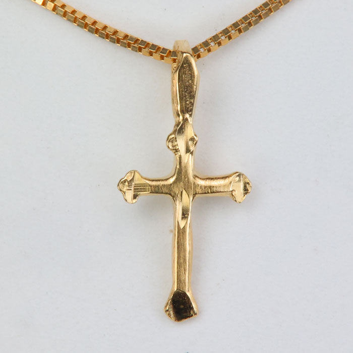 diamond cut cross pendant in yellow gold