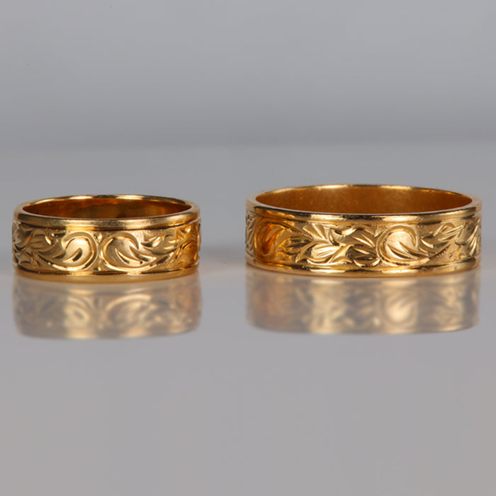detailed yellow gold estate band set of rings