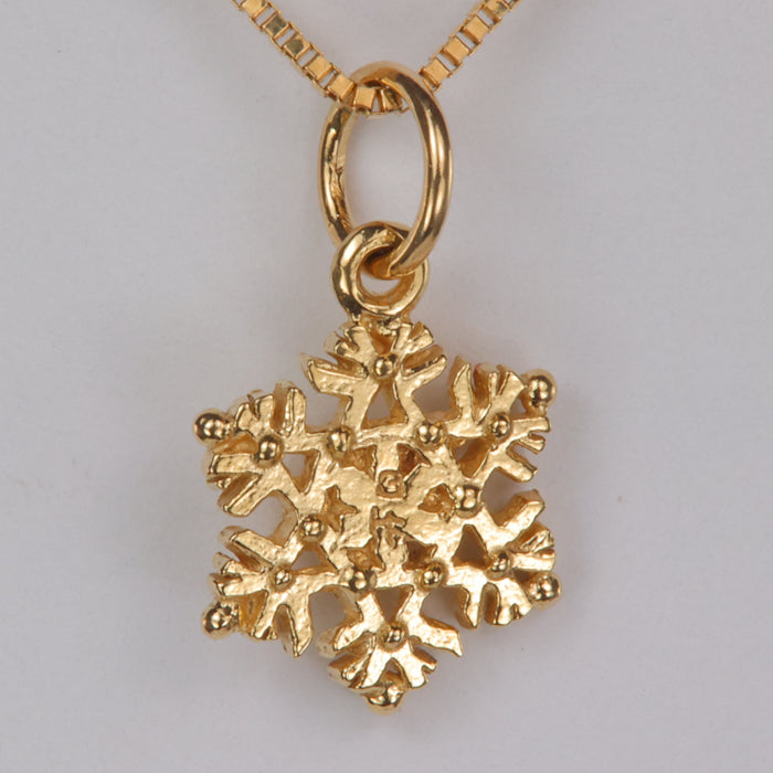 estate snowflake pendant in yellow gold
