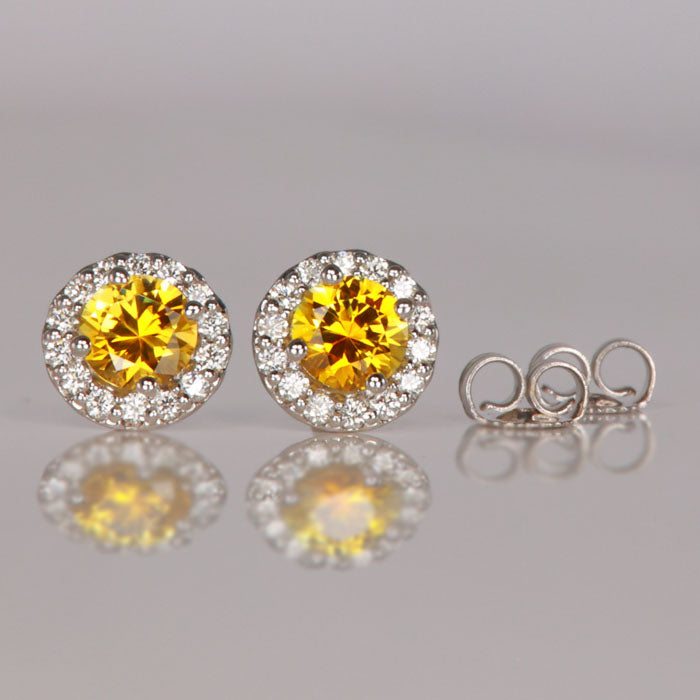sapphire stud earrings yellow in white gold diamond halo