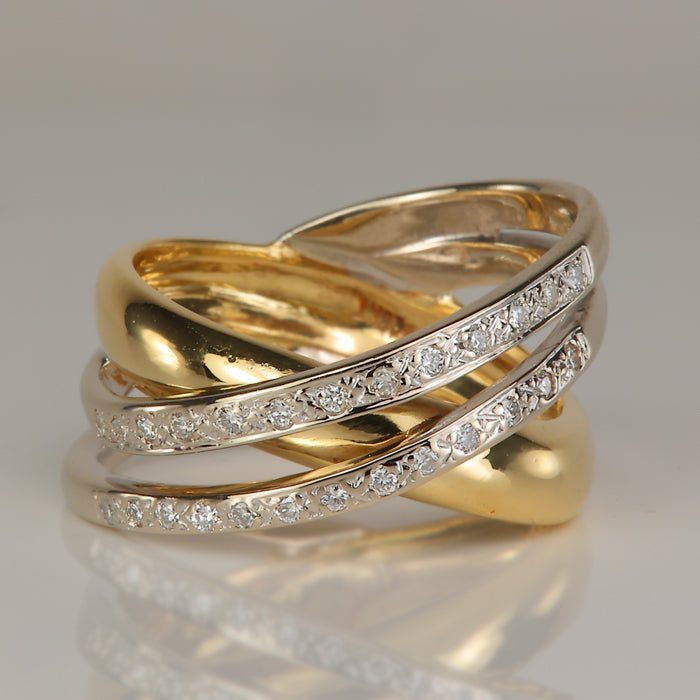 estate ring with diamond accents in yellow and white gold criss cross style
