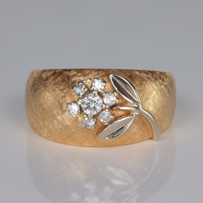 yellow and white gold flower ring with diamonds