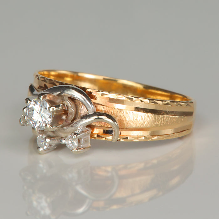 yellow and white gold diamond accent ring with diamond cut and brushed details