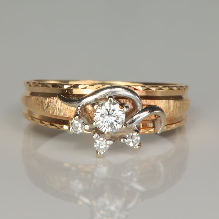 yellow and white gold diamond accent ring with diamond cut and brushed details