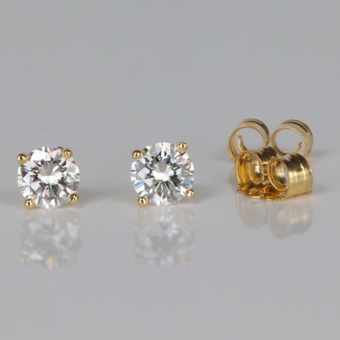 round brilliant yellow gold diamond stud earrings