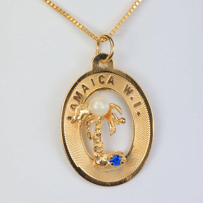 gold Jamaica pendant with pearl and glass gem