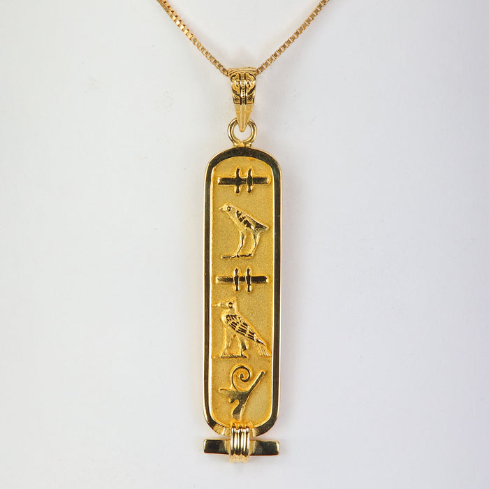 gold cartouche spelling out "Susan"