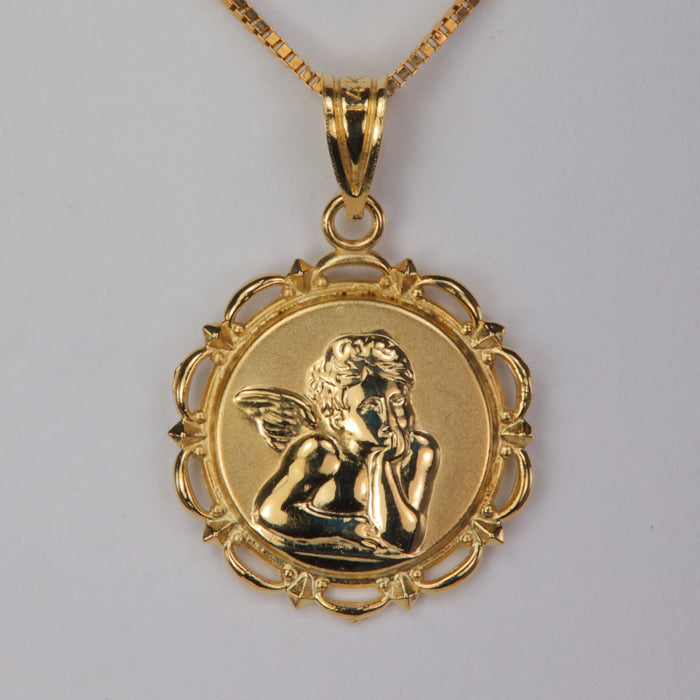estate gold pendant with angel