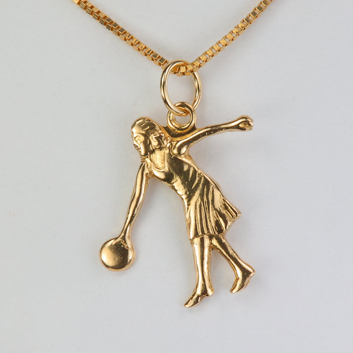 yellow gold pendant with girl bowling
