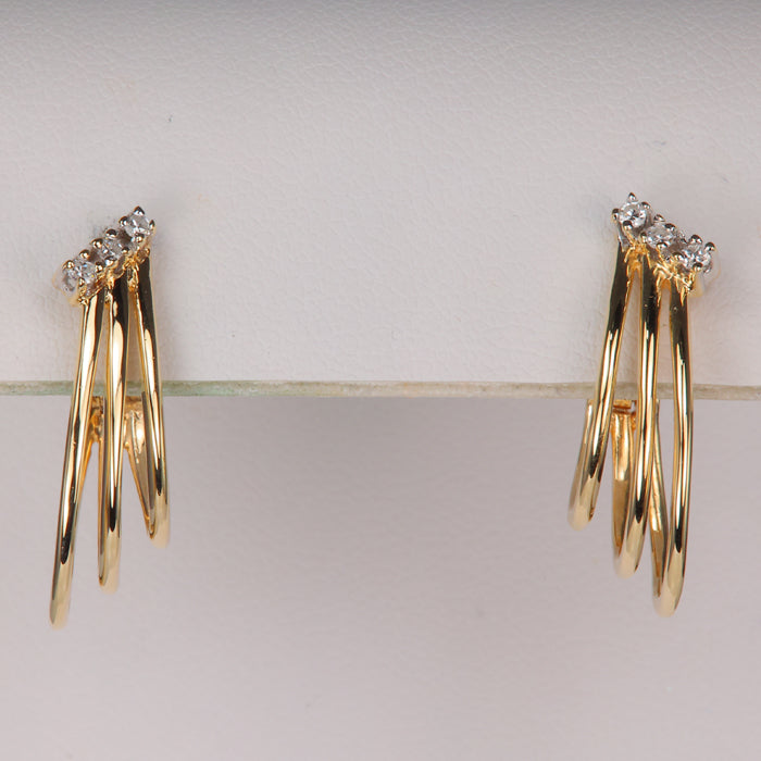 diamond accented yellow gold earrings with hinged backs