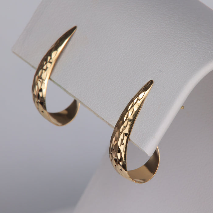 pierced yellow gold diamond cut design earrings