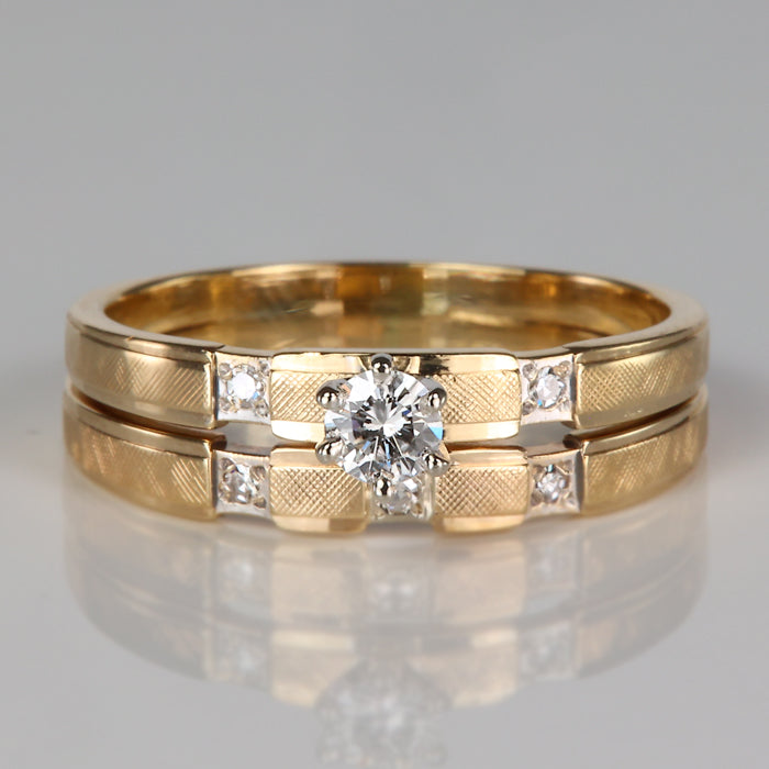 yellow gold crosshatch textured ring set with diamonds