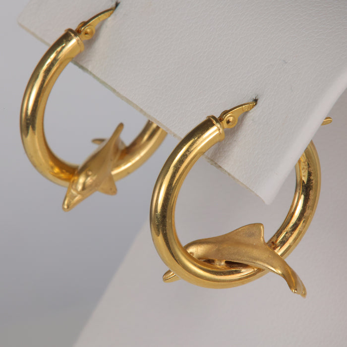 yellow gold hoops with dolphins 