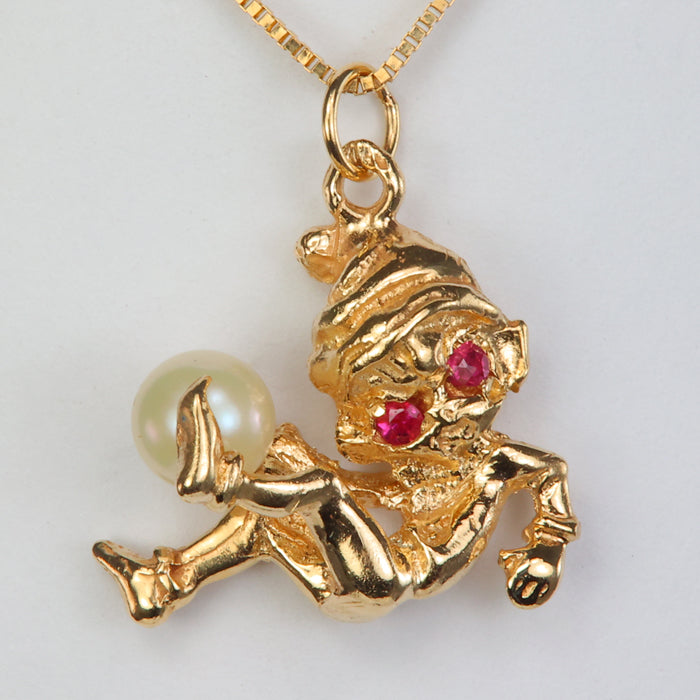 yellow gold elf pendant with rubies and pearl