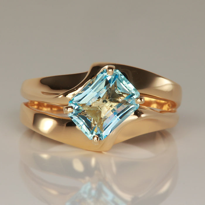 estate ring with emerald cut aquamarine gemstone 