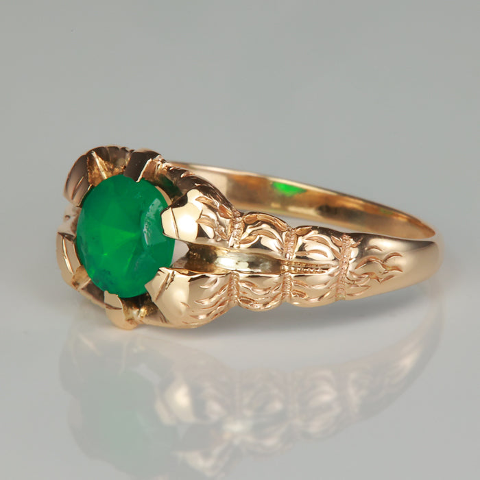 gold estate ring with green glass