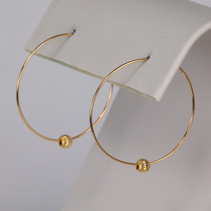estate yellow gold hoop earrings with gold bead