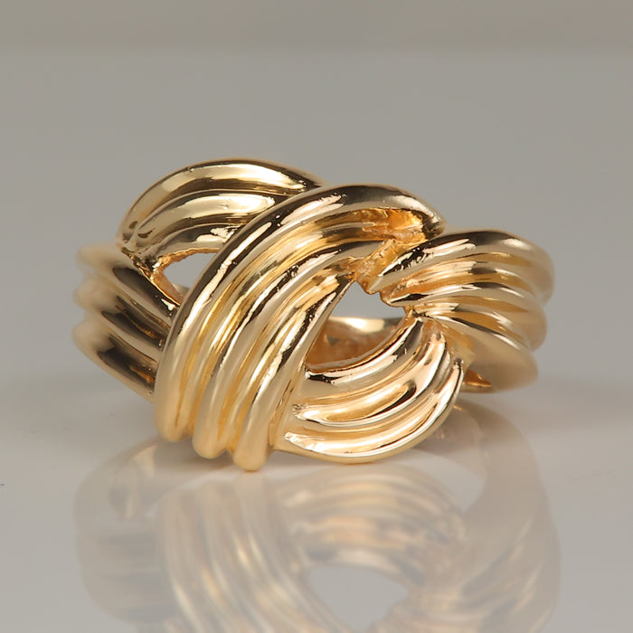 yellow gold knotted style ring 