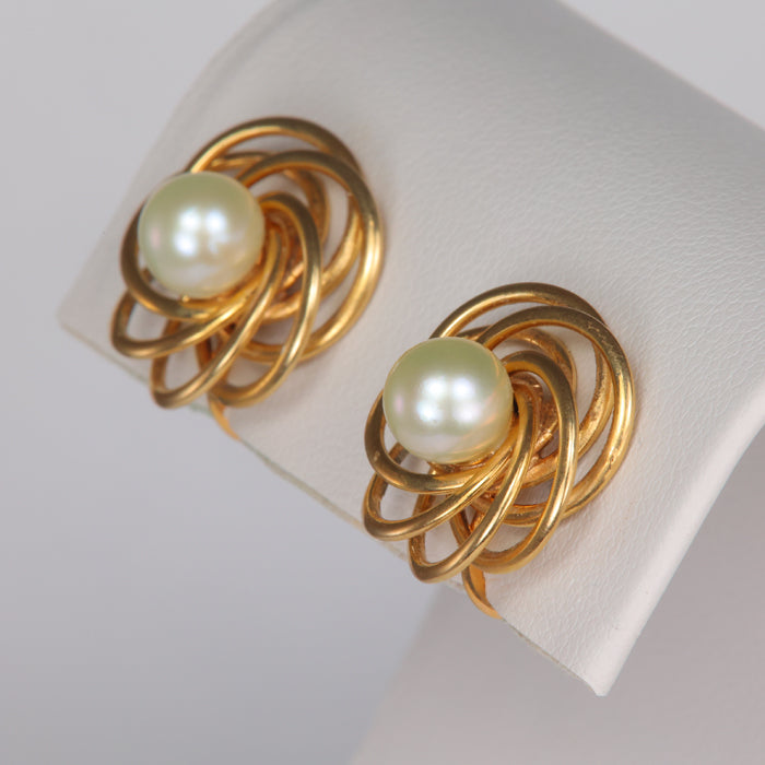 yellow gold pearl earrings in nested setting screwbacks