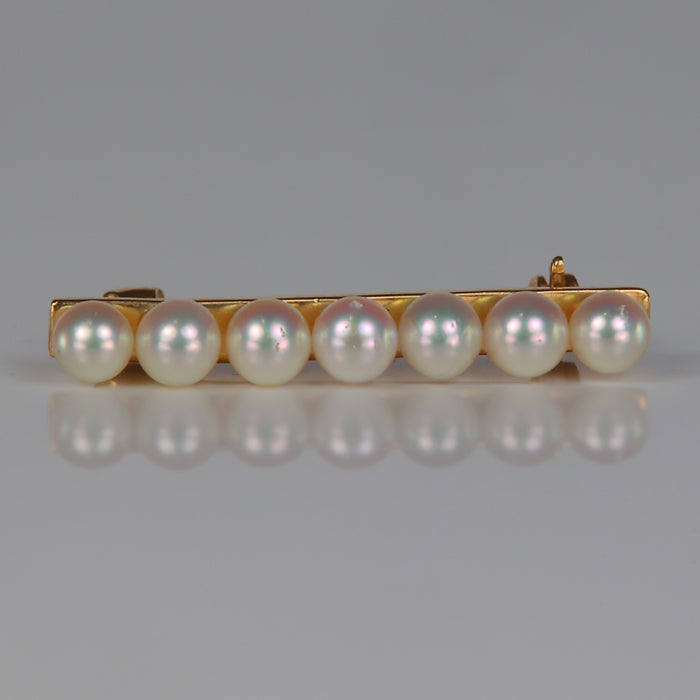 pin in yellow gold with pearls 