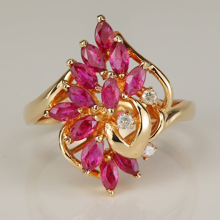 marquise cut ruby and diamond yellow gold ring