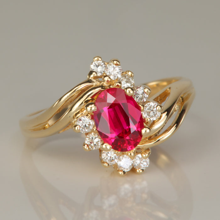 yellow gold oval cut synthetic ruby and diamond ring