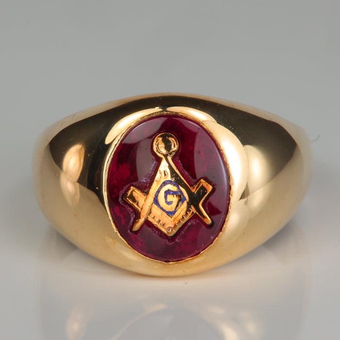 yellow gold synthetic ruby ring with freemason logo