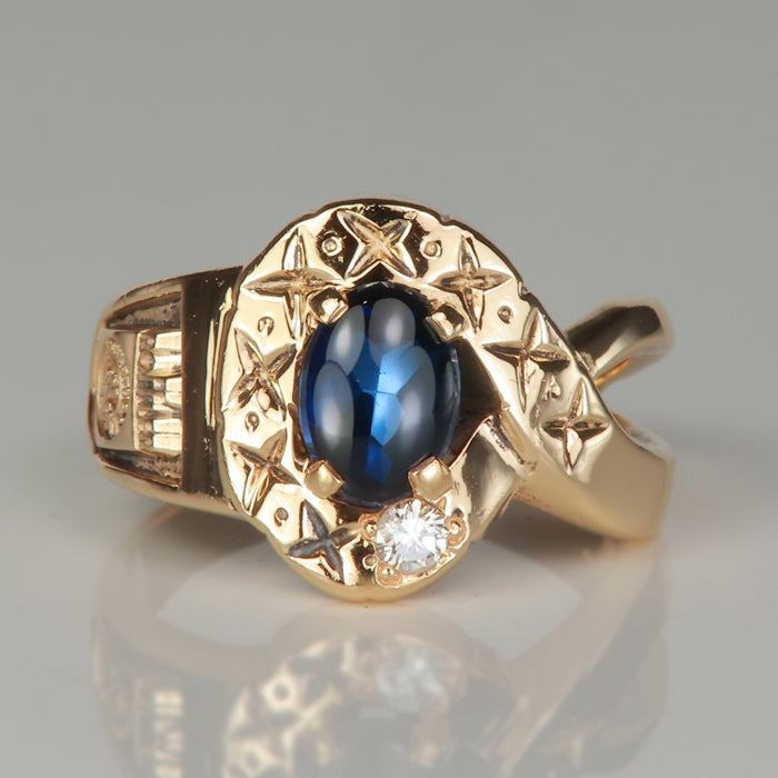 synthetic cabochon sapphire and diamond accent ring