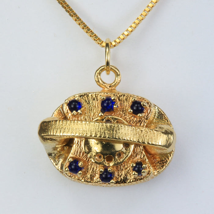 pendant in yellow gold with blue gems