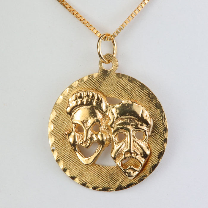 yellow gold pendant charm with theater masks