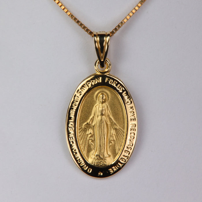 Virgin Mary pendant in yellow gold 