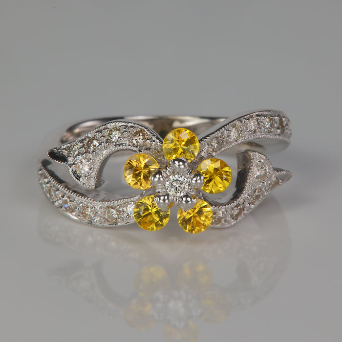white gold ring with yellow sapphires and diamonds in flower design