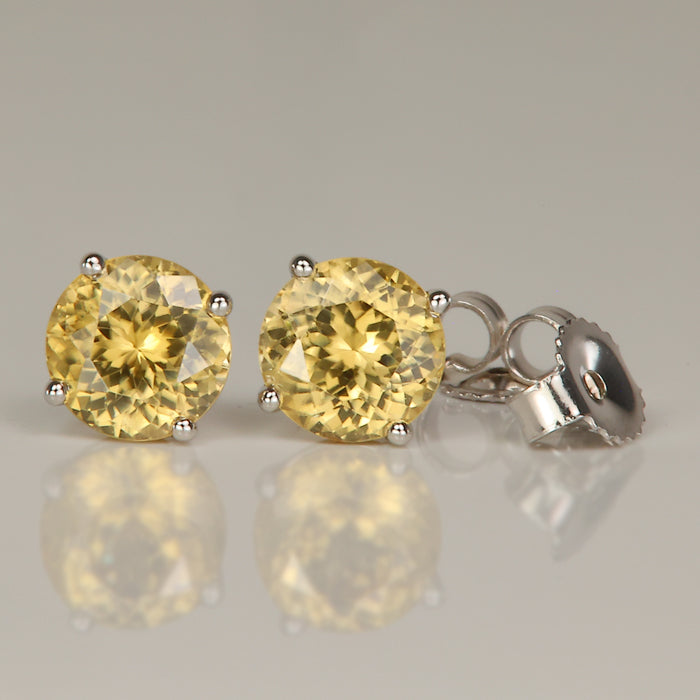 white gold yellow zircon studs