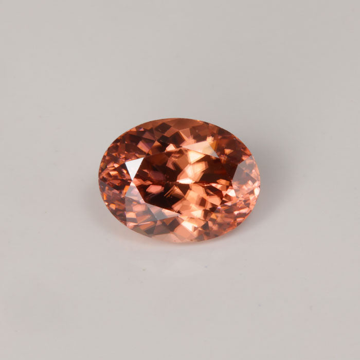 pinkish brown zircon oval cut
