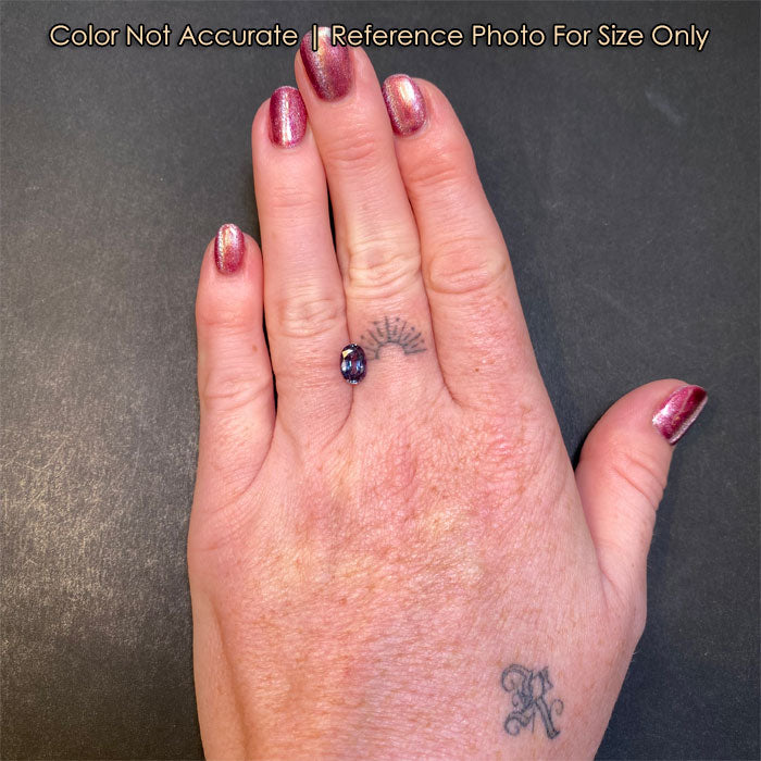 size of alexandrite gem on a hand