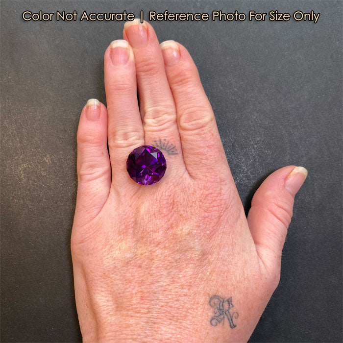 size of round cut amethyst gemstone on hand