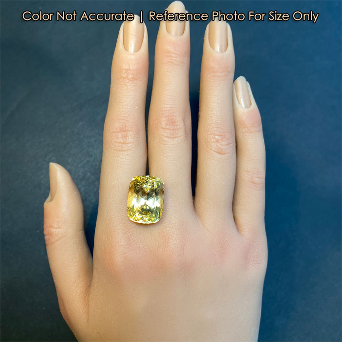 yellow color antique cushion scapolite on hand