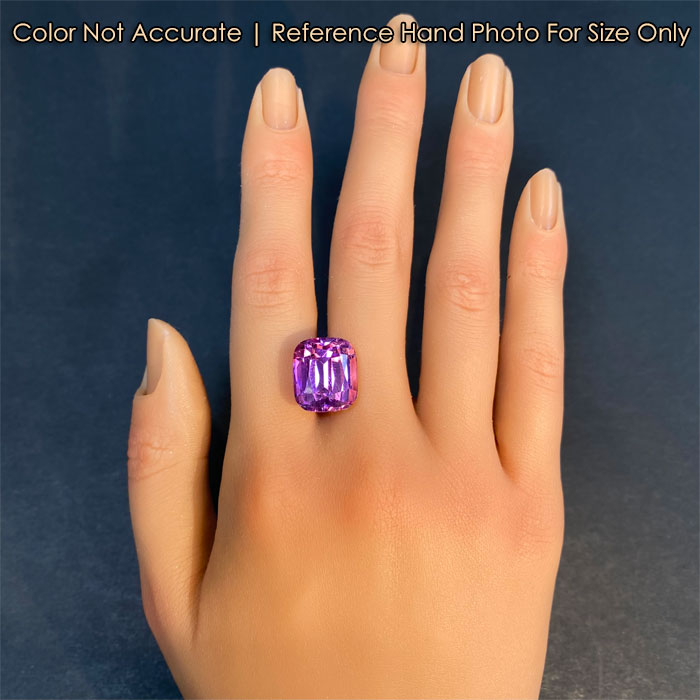 pink color kunzite gemstone on hand 
