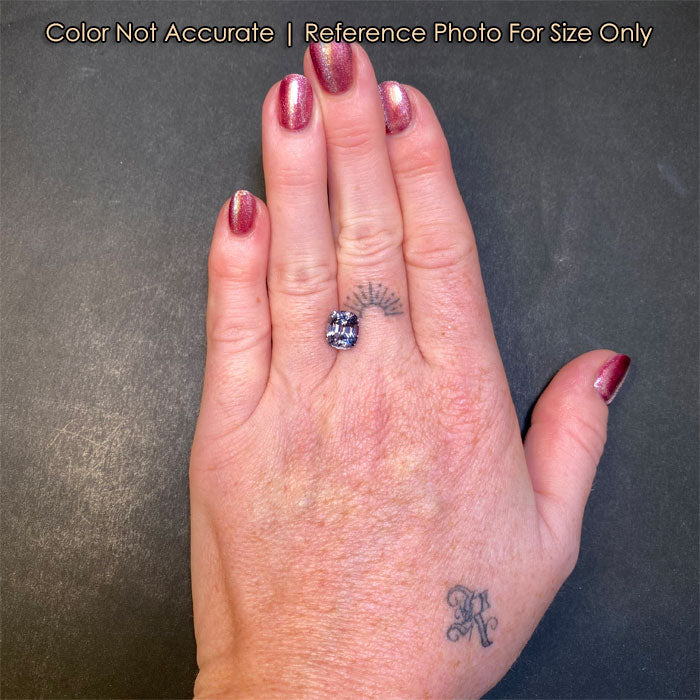 natural color spinel gem on hand