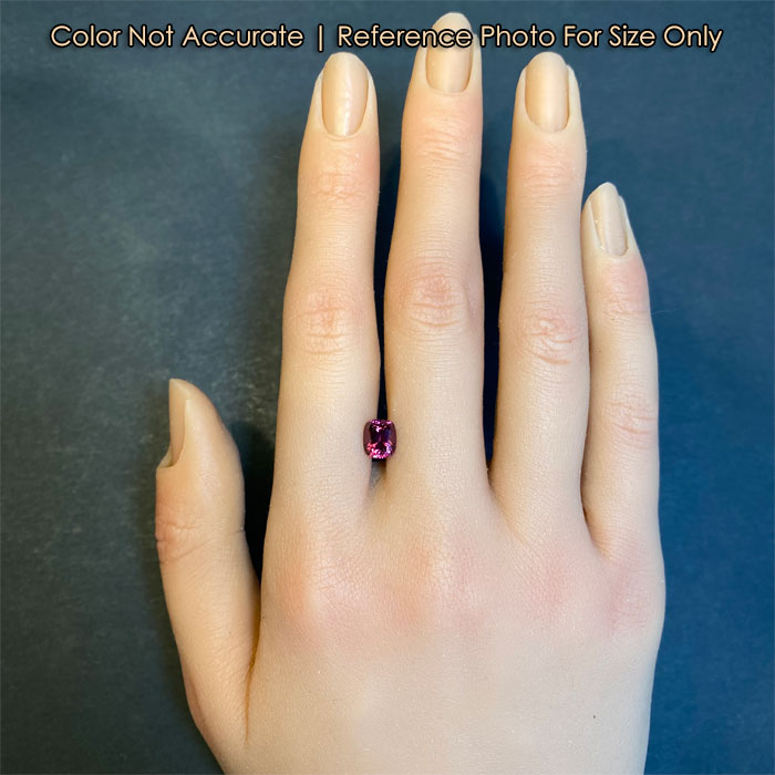 violet red spinel gem antique cushion on hand 