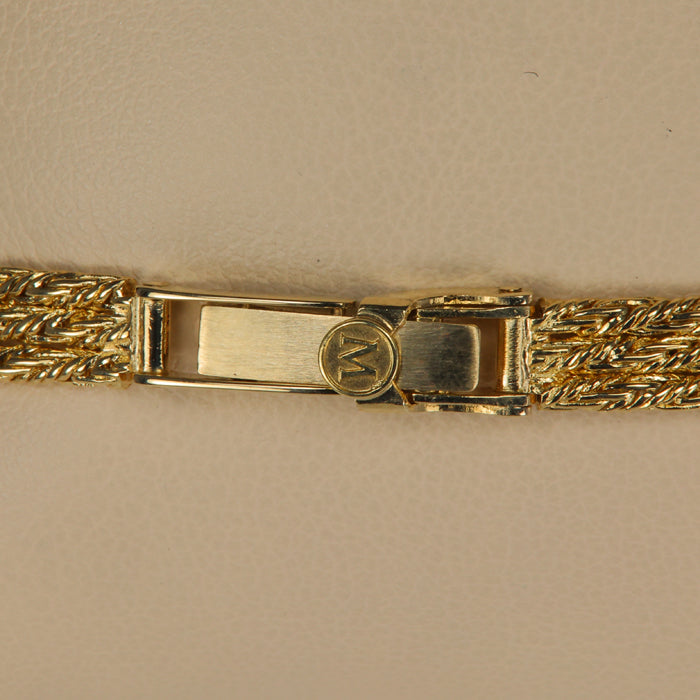 clasp of yellow gold Movado estate watch
