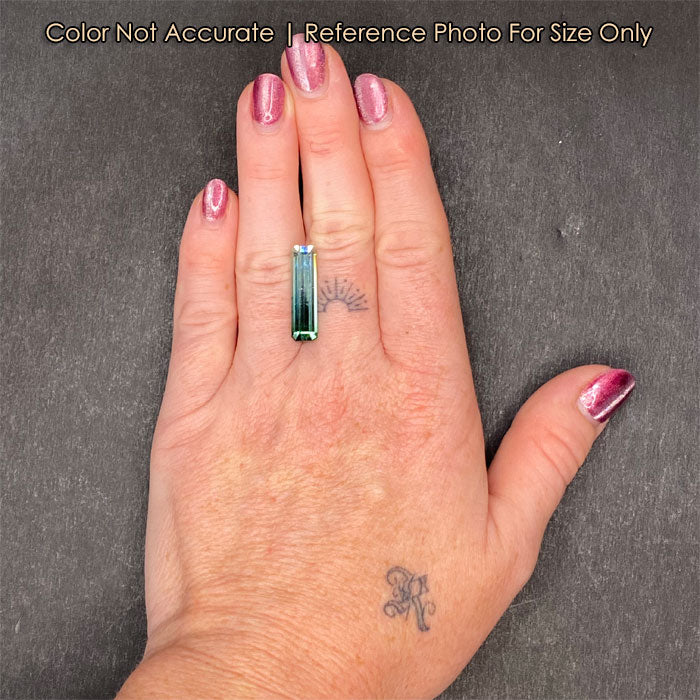 large tourmaline on hand