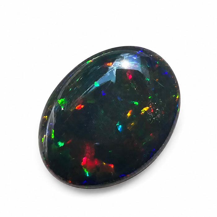 oval cabochon cut black opal gemstone color flashes