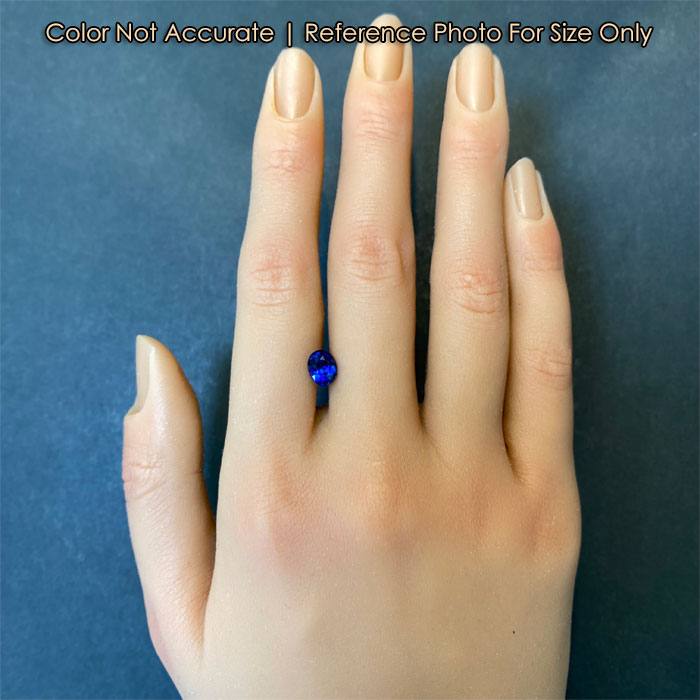 oval blue sapphire gem size to hand