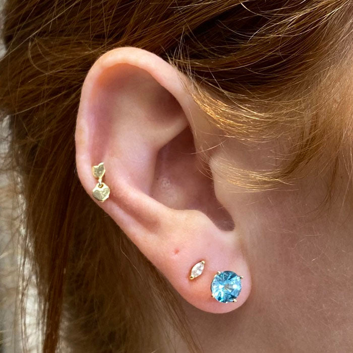 blue zircon stud earrings yellow gold