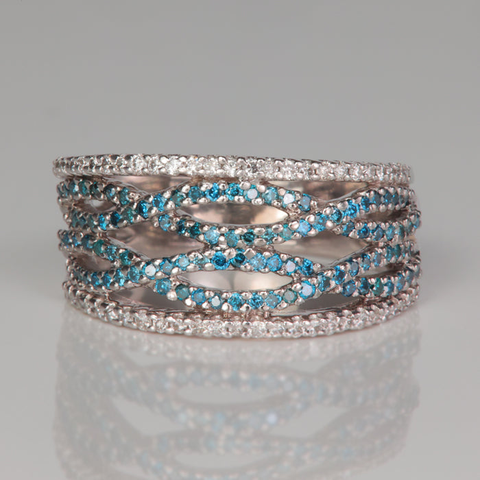 blue diamond and diamond ring in white gold